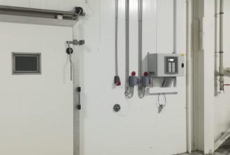 Climate control system mounted next door on the wall