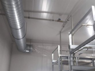 Part of the room with the installation of watering system